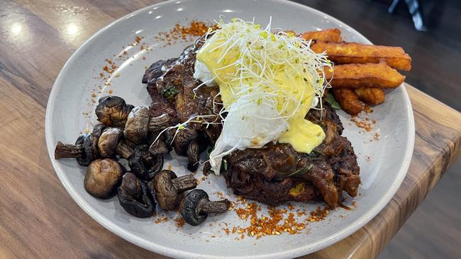 Beef brisket on sweet potato hash cakes with haloumi chips.