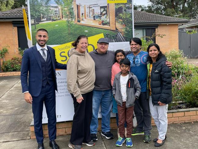 L-R Ray White Oakleigh agent James Rasool, the vendors, and the buyers of 19 Murumba Drive, Oakleigh South. For Herald Sun Real Estate