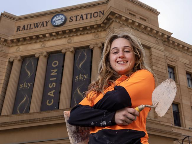 September 26, 2024: SA's first female stonemason crowned apprentice of the year Bianca Taylor outside the Adelaide railway station where she worked on restoration of the 1856 facade. Picture: Kelly Barnes