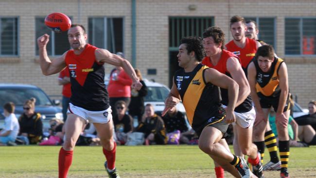Ryan O’Callaghan, left, playing for Mildura against Red Cliffs in 2015. Picture: Glenn Milne