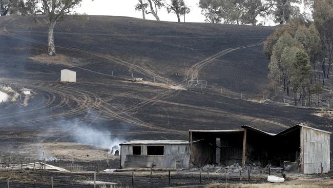 A burnt-out shed and scorched earth at Woodside, in Adelaide. Picture: AAP