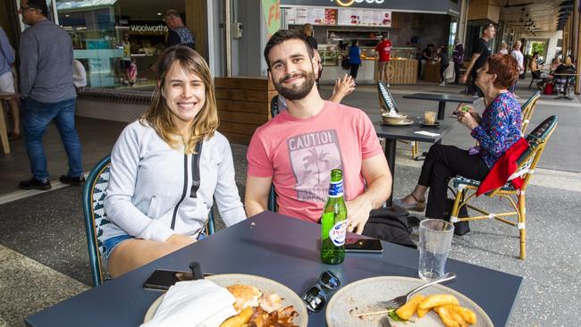 Paulo Ventura and Carolina Carli having their first cafe meal since restrictions eased at Madison's Cafe in Broadbeach Mall. Picture: Nigel Hallett