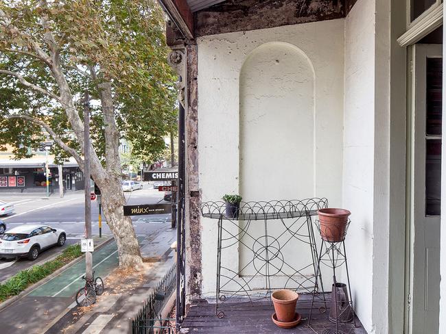 The upstairs balcony which has no railing.