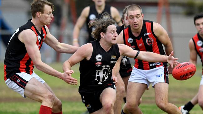 Port District’s James Batty during a clash with Rostrevor Old Collegians. Batty booted six goals in the Magpies’ victory against Adelaide University on Saturday. Picture: Mark Brake/AAP