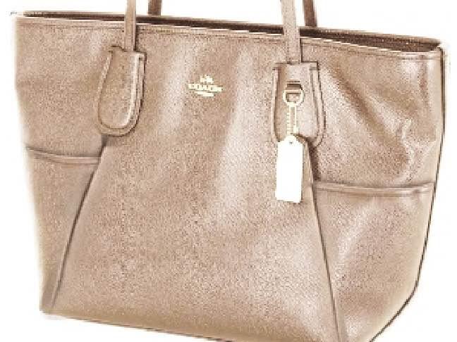 Karen Ristevski was believed to be carrying a purse and handbag similar to these.