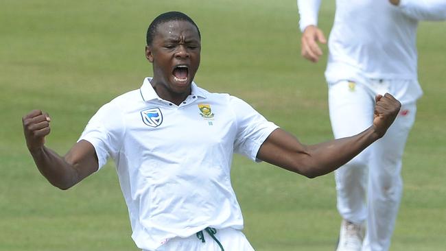 DURBAN, SOUTH AFRICA - MARCH 02: Kagiso Rabada of the Proteas celebrates the wicket of Tim Paine of Australia during day 2 of the 1st Sunfoil Test match between South Africa and Australia at Sahara Stadium Kingsmead on March 02, 2018 in Durban, South Africa. (Photo by Lee Warren/Gallo Images/Getty Images)