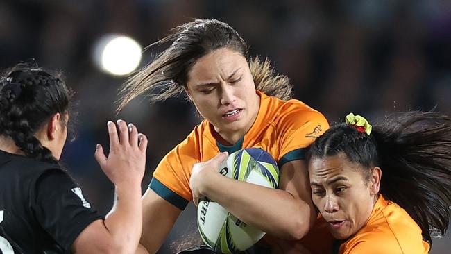 AUCKLAND, NEW ZEALAND - OCTOBER 08: Bienne Terita of Australia is tackled during the Pool A Rugby World Cup 2021 New Zealand match between Australia and New Zealand at Eden Park on October 08, 2022, in Auckland, New Zealand. (Photo by Phil Walter/Getty Images)