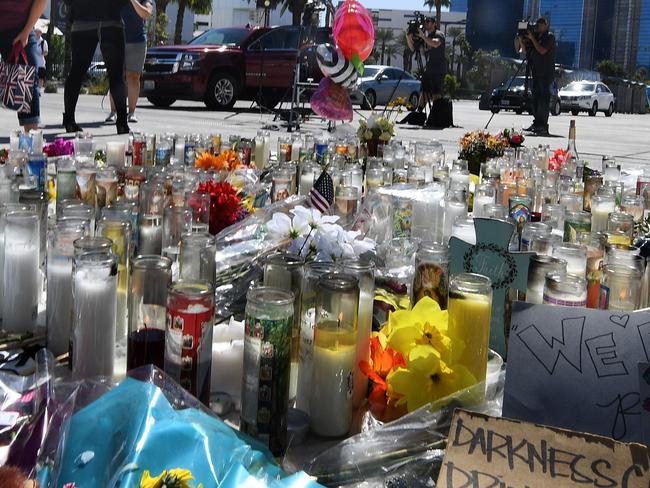 A makeshift memorial on the Las Vegas Strip pays tribute to those killed after Paddock killed 59 people and wounded more than 500 others. Picture: Mark Ralston/AFP