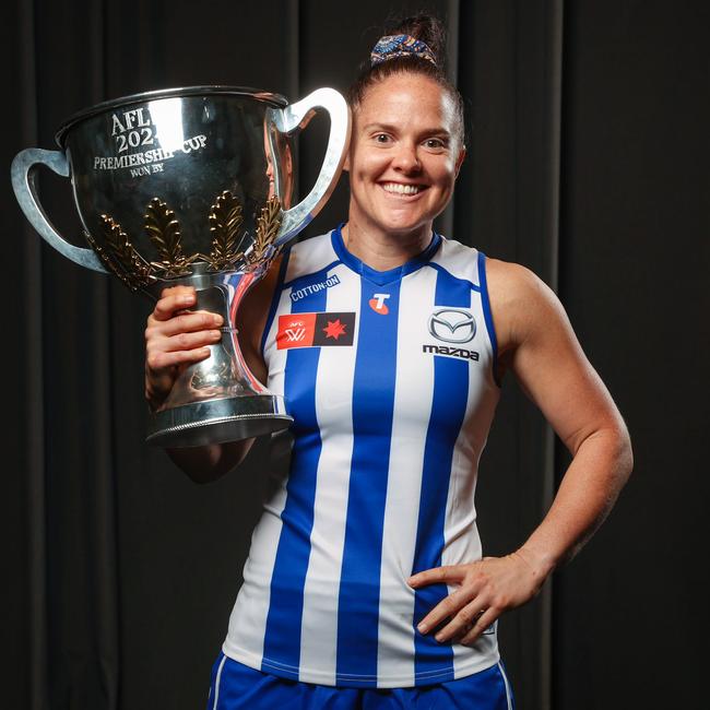 North Melbourne captain Emma Kearney with the 2024 AFLW premiership cup. Picture: Jake Nowakowski