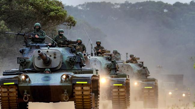 Taiwanese soldiers operating tanks during a drill in an undisclosed location in Taiwan as China conducts military exercises around the self-ruled island.