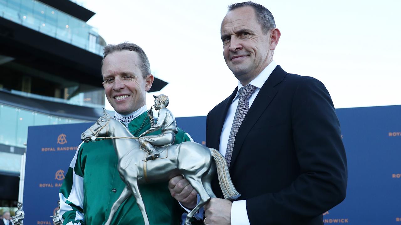 Kerrin McEvoy and Chris Waller with the Winx Stakes trophy. Picture: Jeremy Ng/Getty Images