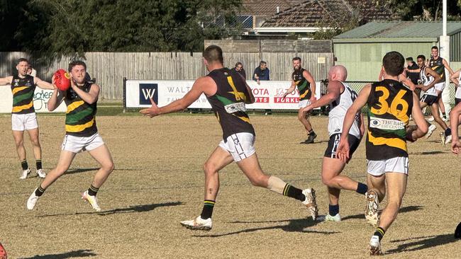 Bryce Hornsby with the ball for Dromana. Picture: Simon McEvoy