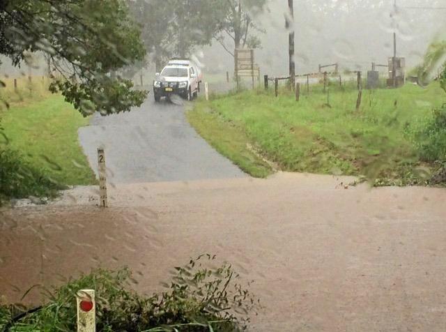 SES on scene art Lindendale after a call for help at a flooded crossing. Picture: Marc Stapelberg