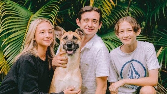 The Follan children with family dog Bindi. Picture: Supplied.