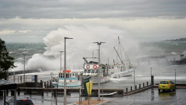 Huge swells smash Mornington pier on Sunday, April 5, 2020. Picture: Adam Richmond