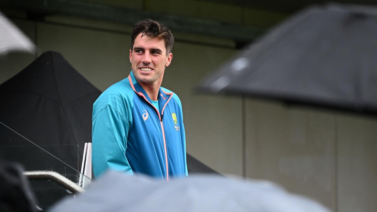 Winners are grinners: Pat Cummins smiles at the fans after securing the Ashes. Picture: Getty