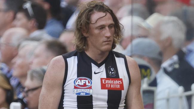 MELBOURNE, AUSTRALIA - SEPTEMBER 30: Nathan Murphy of the Magpies reacts on the bench after leaving the field for tests after a contest during the 2023 AFL Grand Final match between Collingwood Magpies and Brisbane Lions at Melbourne Cricket Ground, on September 30, 2023, in Melbourne, Australia. (Photo by Daniel Pockett/AFL Photos/via Getty Images)