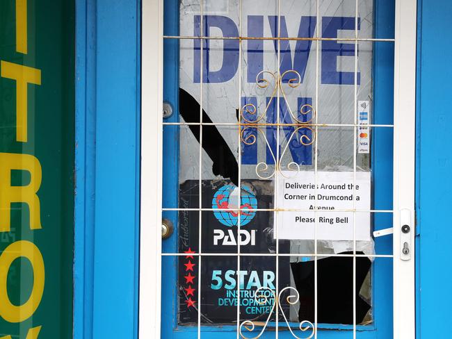 Broken windows at Australian Diving Instruction on Melbourne Rd Drumcondra where a man was injured during an explosion. Picture: Alison Wynd