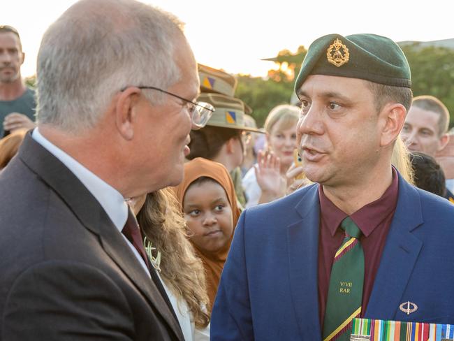 ELECTION TEAM 2022LIBERAL BUS TOUR 25/4/2022Prime Minister Scott Morrison in Darwin, Northern Territory attending ANZAC day dawn service laying a wreath at the Darwin Cenotaph War Memorial.Richard Miles despite leader opposition in attendance. Picture: Jason Edwards