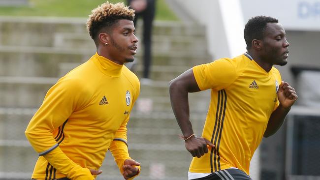 Kwadwo Asamoah (right) and Mario Lemina train with Juventus at Melbourne’s Lakeside Oval on Tuesday ahead of the ICC.