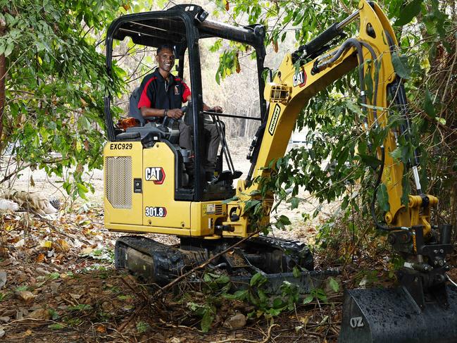 The Queensland Government has signed a historic land use agreement with the Djabugay Nations traditional owners to allow for the continuation of works on the Wangetti Trail hiking and cycling track, from Palm Cove to the Mowbray River. Yarrabah youngster Touche Gray has scored a plant operator traineeship with Wagners Australia to work on the Wangetti Trail currently under construction at Palm Cove. Picture: Brendan Radke