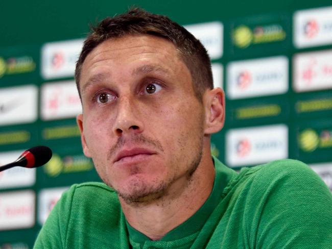 Australia's midfielder Mark Milligan speaks during a press conference in Kazan on June 22, 2018, as part of the Russia 2018 World Cup football tournament. / AFP PHOTO / SAEED KHAN