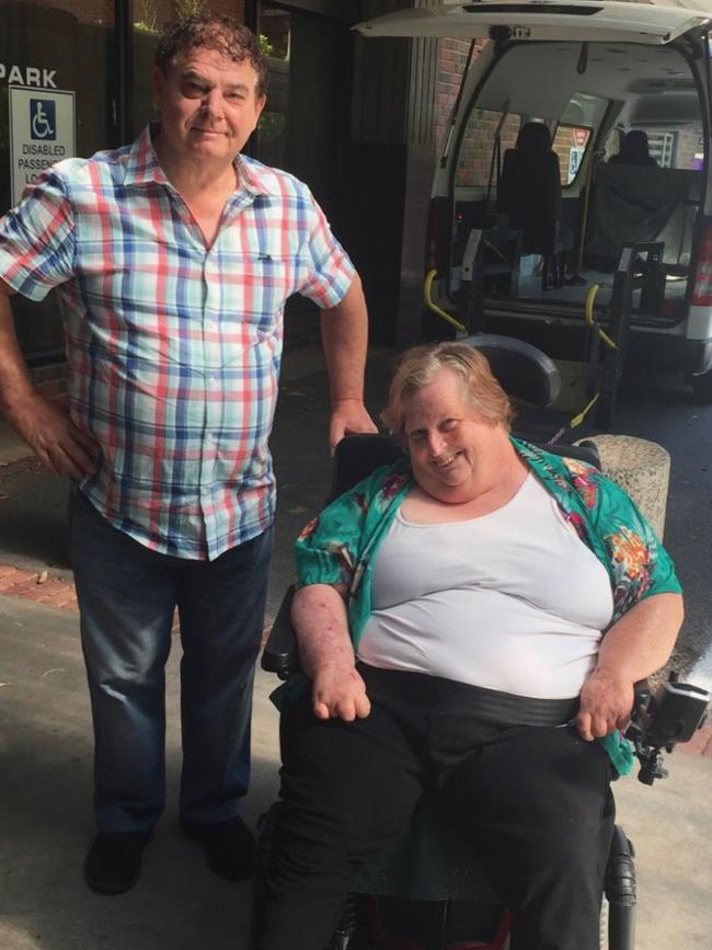 Mr Gonis with his friend Mary, who he helped get from the Julia Farr Centre to spend Christmas with family, along with dozens of other residents. Picture: Supplied