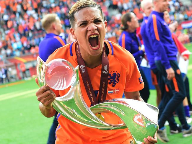 Netherlands’ forward Shanice van de Sanden celebrates with the trophy after winning with her team the UEFA Women’s Euro 2017 football tournament final match between Netherlands and Denmark at Fc Twente Stadium in Enschede on August 6, 2017. Picture: Tobias SCHWARZ/AFP