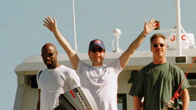 09 jun 1998. actor / comedian Jerry Seinfeld [on dive boat, 'Haba Dive.'] leaving Port Douglas, flanked by his minders / bodyguards Photo Campbell/Scott. headshot qld visit