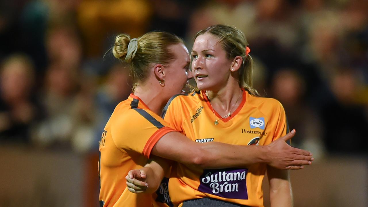 BRISBANE, AUSTRALIA - OCTOBER 06: Claire Colwill of the Brisbane Blaze celebrates with team mates during the round two Hockey One Women's League match between Brisbane Blaze and Canberra Chill at Queensland State Hockey Centre, on October 06, 2022, in Brisbane, Australia. (Photo by Albert Perez/Getty Images)