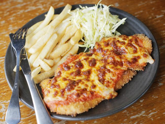 Hobart hotel Tom McHugo’s is offering their classic chicken parmi and chips as a takeaway meal for $16. Picture: MATHEW FARRELL