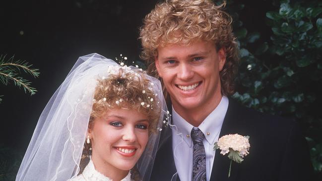 A photo from November, 1999 featuring Henry (Craig McLaughlin) and Charlene (Kylie Minogue) at the wedding of Charlene and Scott (Jason Donovan) in Neighbours. (Photo: Grundy Organisation)