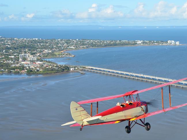 Antique Airways Tiger Moth flying over Redcliffe for Moreton Life ONLY. Phone Kylie Knight 3480 8226.