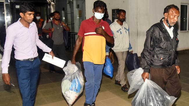 Sri Lankan asylum-seekers arrive at Negombo Magistrates Court after their return from Christmas Island on an RAAF flight. Picture: Pradeep Pathirana