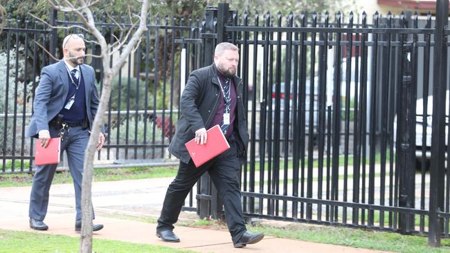 Detectives door knocking in Elizabeth Grove on Thursday morning. Picture: Dean Martin