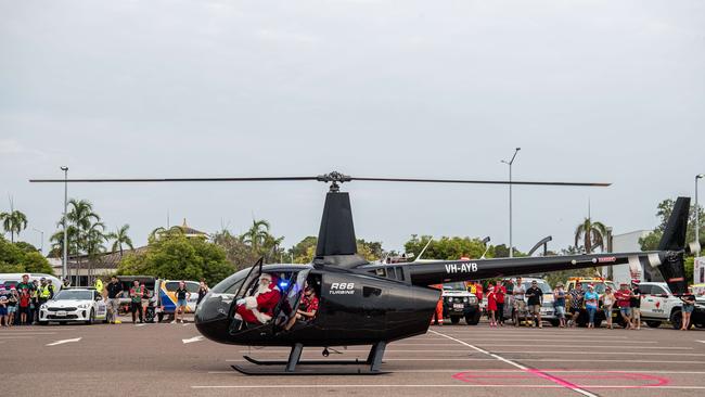 Dozens of excited children and parents watched Santa’s spectacular arrival at Casuarina Square. Picture: Pema Tamang Pakhrin.