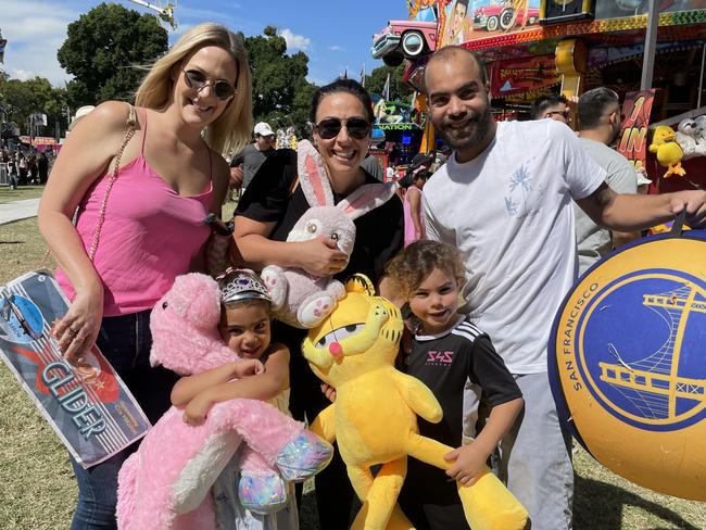 Stonnington friends Felicity Burt, Monqiue Moussi, Cody Austin and Raiah and Zaria and their huge haul of prizes at Moomba on Saturday, March 11 2023.