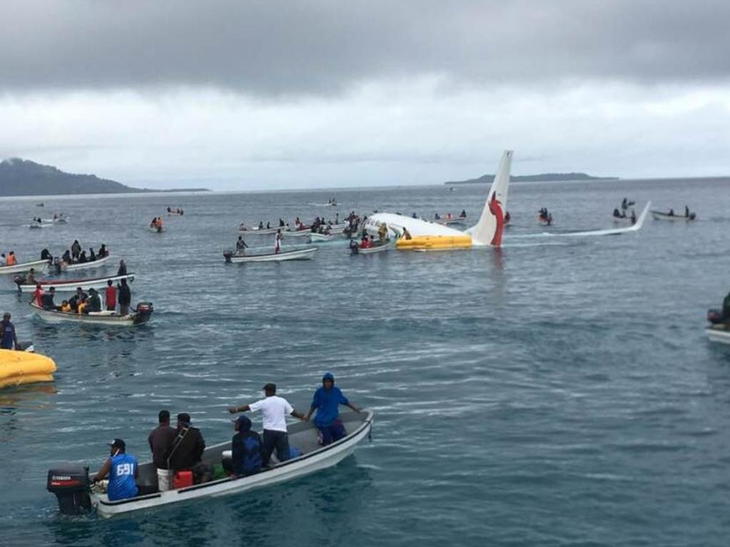 Passengers are taken to shore by local fishermen. Picture: Twitter