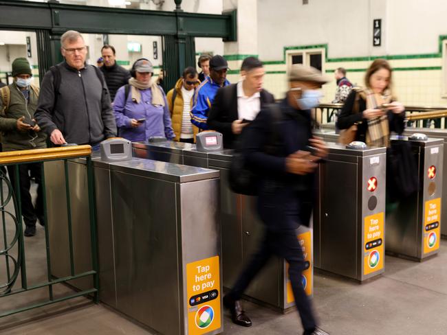 SYDNEY, AUSTRALIA - NewsWire Photos JUNE 27, 2024: Commuters pictured using opal cards and other cards as they exit St James train station in the Sydney CBD. Opal card fares will increase by an average of 3.6 per cent in four days, however the government says the majority of fares should increase by less than $1 a week. Picture: NewsWire / Damian Shaw