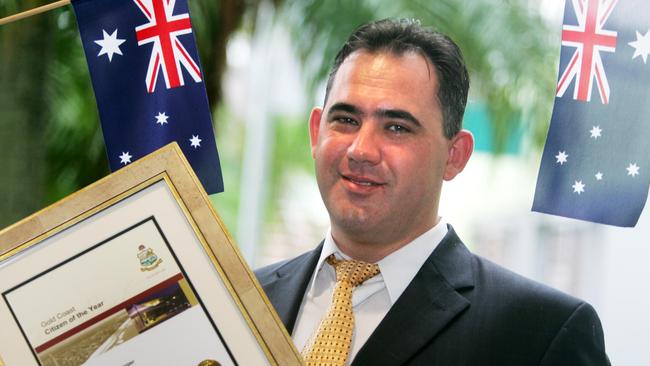 Dr Thomas Challenger holds his Gold Coast Citizen of the year award in 2009. Picture: supplied