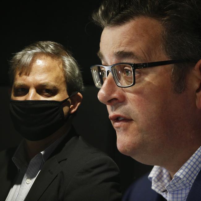 Victorian Chief Health Officer Brett Sutton (L) looks on as Victorian Premier Daniel Andrews speaks to the media during a press conference in Melbourne in October 2020. Picture: NCA NewsWire / Daniel Pockett