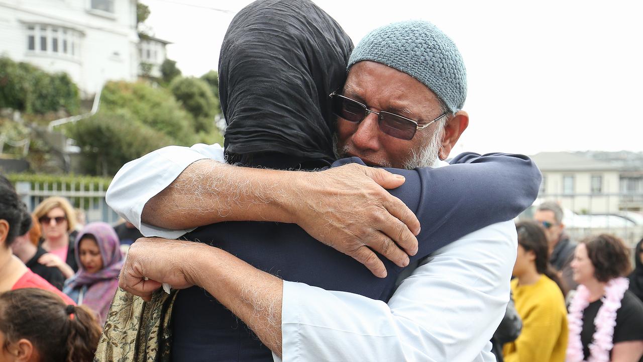 Prime Minister Jacinda Ardern hugs a mosque-goer at the Kilbirnie mosque on March 17, 2019 in Wellington, New Zealand. Picture: Hagen Hopkins/Getty Images.