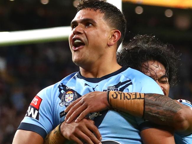 BRISBANE, AUSTRALIA - JUNE 27: Latrell Mitchell of the Blues celebrates after scoring a try during game two of the 2021 State of Origin series between the Queensland Maroons and the New South Wales Blues at Suncorp Stadium on June 27, 2021 in Brisbane, Australia. (Photo by Chris Hyde/Getty Images)