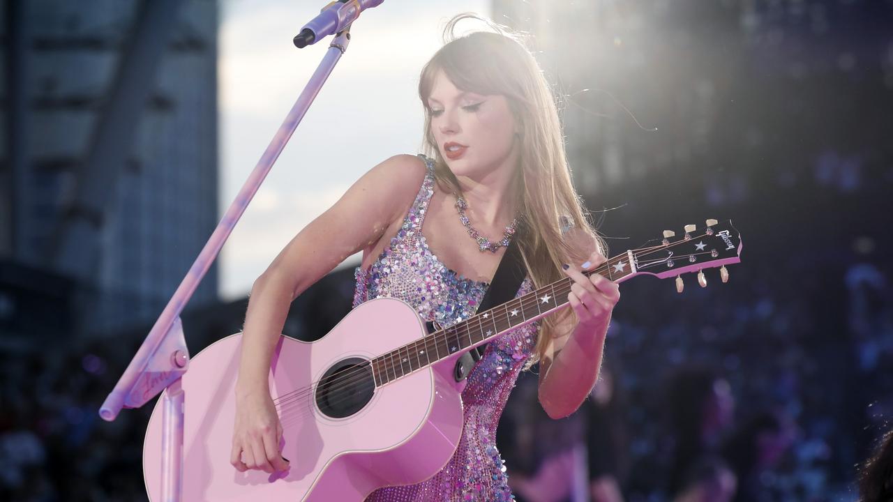 Who doesn’t love a pink guitar? Picture: Getty Images.