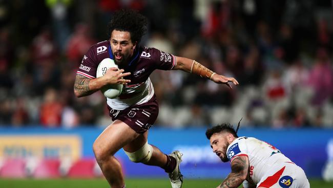 Josh Aloiai of the Sea Eagles is tackled during the round 19 NRL match between the St George Illawarra Dragons and the Manly Warringah Sea Eagles at Netstrata Jubilee Stadium, on July 22, 2022, in Sydney, Australia. (Photo by Jason McCawley/Getty Images)