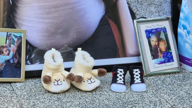 Two pairs of baby booties were part of the vigil: one pair for Diane's baby boy Lloyd, the other for the unborn boy she had been planning on naming Leroy. Picture: NCA NewsWire / Anthony Anderson