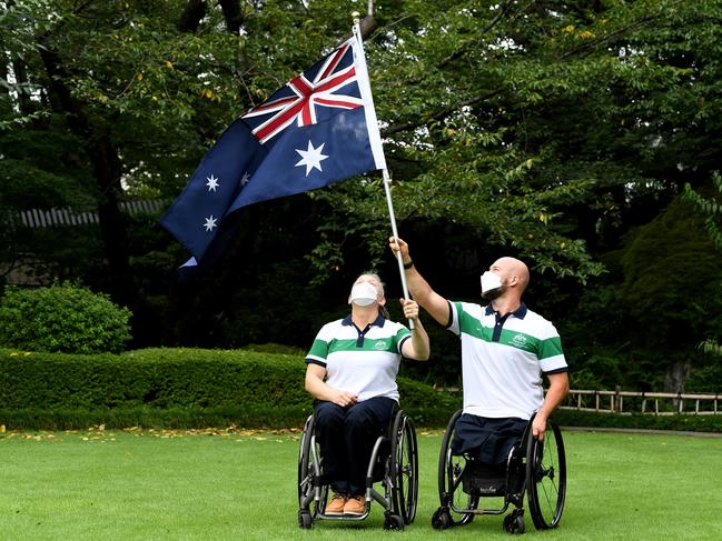 Aussie flagbearers Daniela Di Toro (Para-table tennis) and Ryley Batt (wheelchair rugby). Picture: Jeff Crow