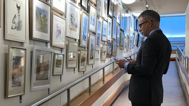 Pictures at an exhibition: Paul Fletcher inspects Ku-ring-gai Art Society Annual Art Awards entrees. Source: Twitter