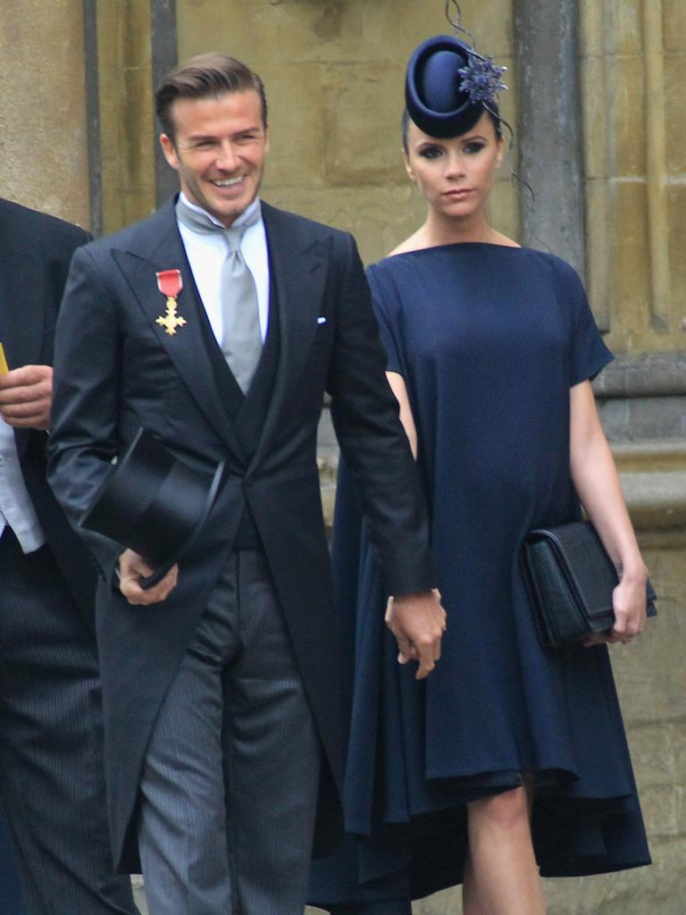 David Beckham and Victoria Beckham arrive to attend the Royal Wedding of Prince William to Catherine Middleton at Westminster Abbey on April 29, 2011.