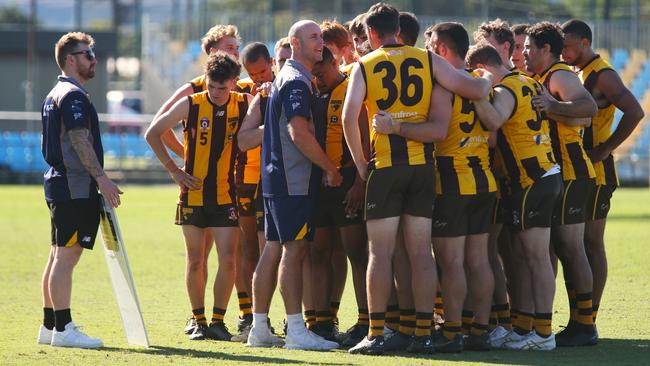 Pictured: Hawks coach Wayne Siekman with team at quarter time. Manunda Hawks v CTB Bulldogs at Cazalys Stadium. Round 8. AFL Cairns 2024. Photo: Gyan-Reece Rocha